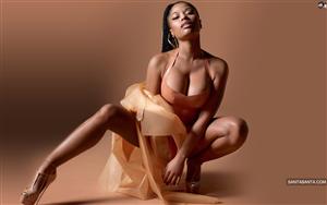 Nicki Minaj poses boldly in a hot and appealing dress